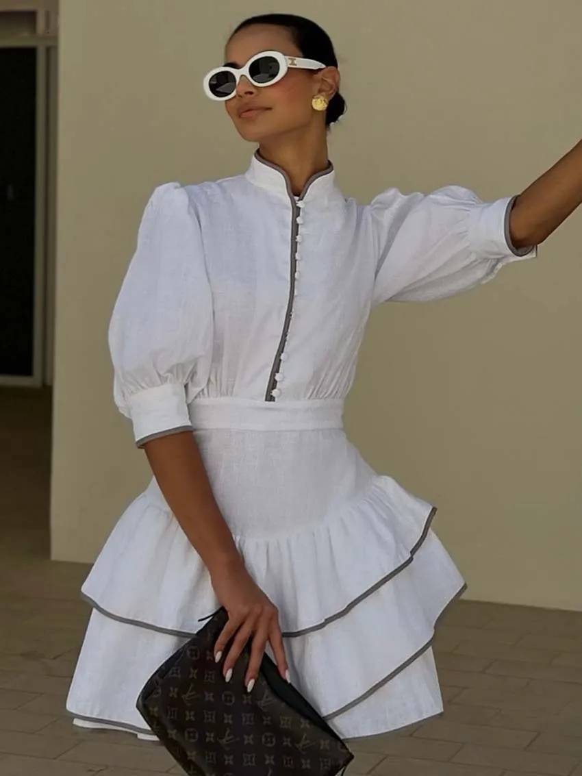 Sofia Patchwork vestido mini con cuello alto