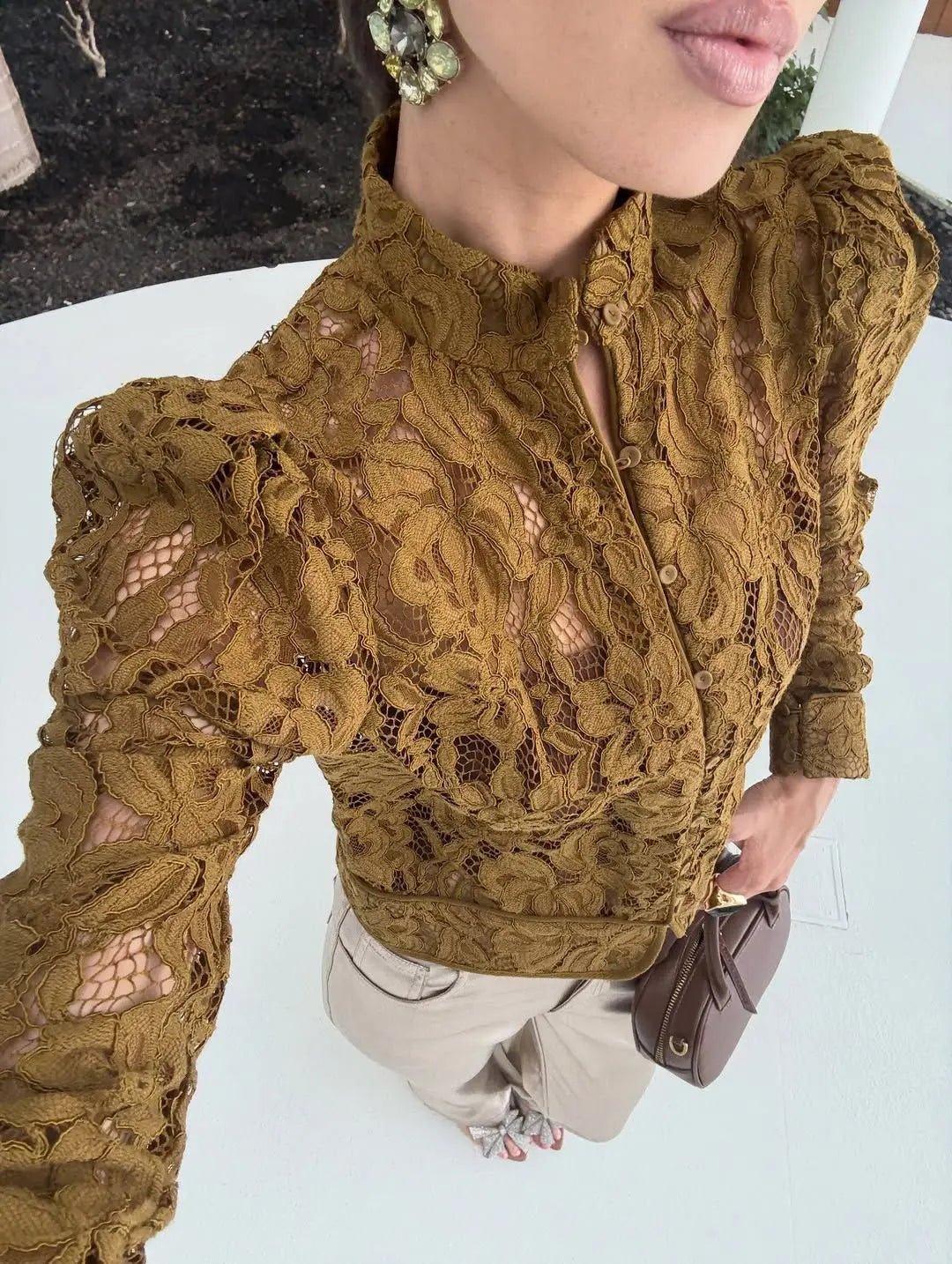 Blusa transparente de encaje Hannah