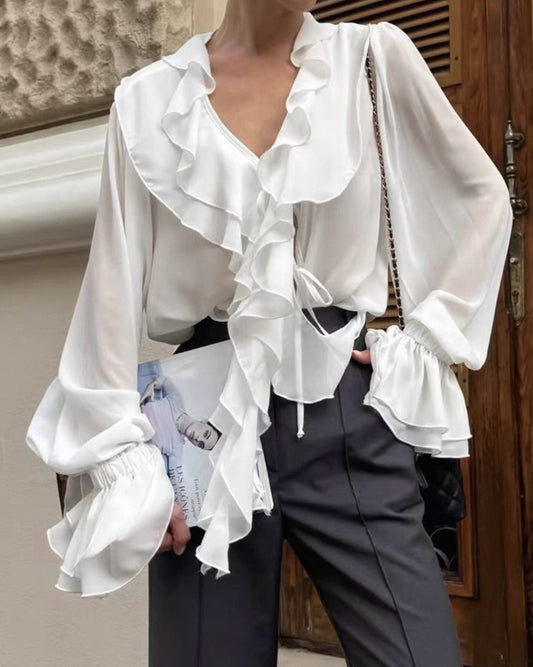 Blusa Monica con lazo al cuello y volantes