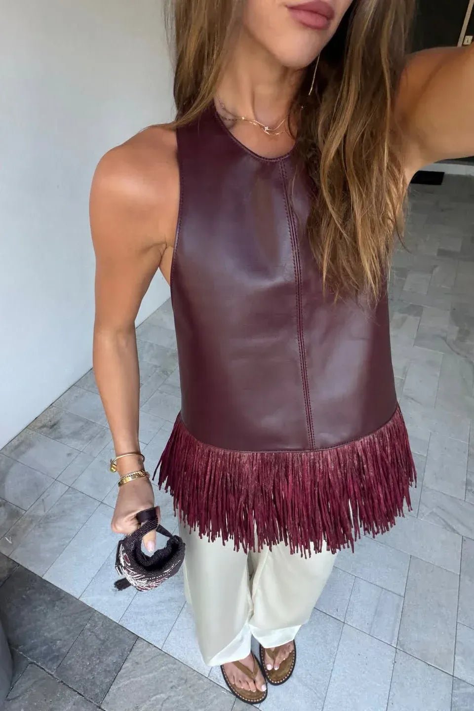 Top halter Gina de flecos en polipiel