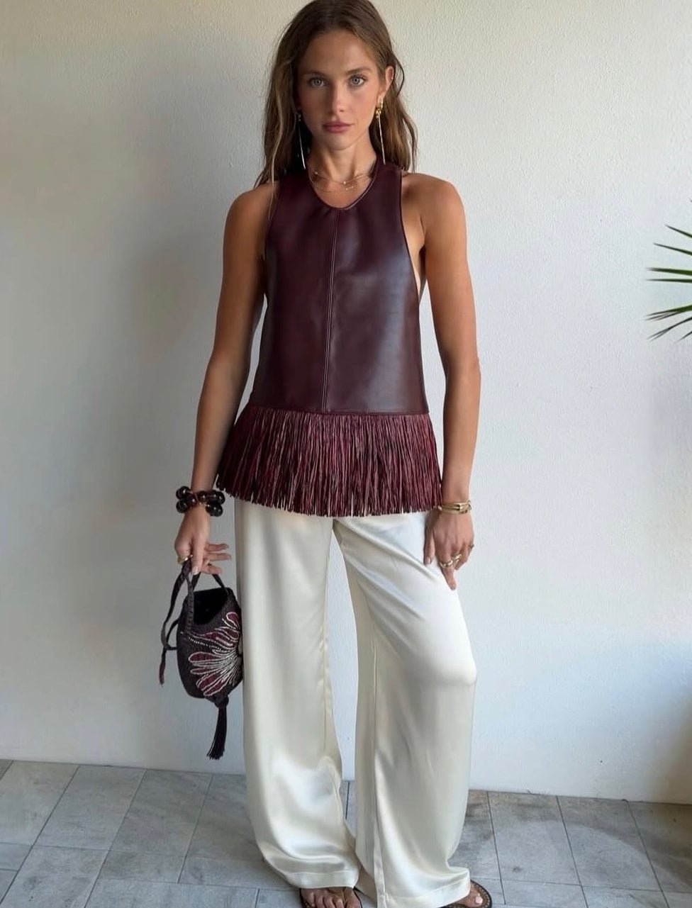 Top halter Gina de flecos en polipiel