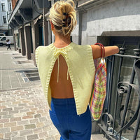Emelia top de punto con espalda abierta
