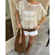 Blusa corta Maia de gasa translúcida con encaje