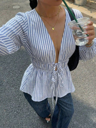 Blusa Mireille de rayas con lazo delantero