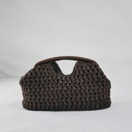 Isabel clutch de paja trenzada en forma de concha